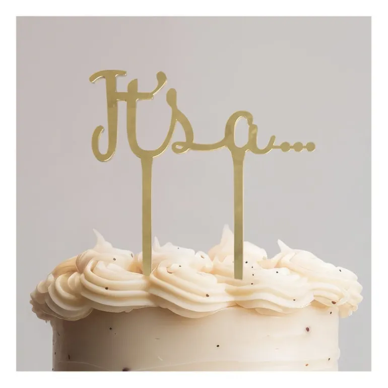 It's a… caketopper - goud