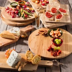 Presenteerplank van mangohout - rond - 50x40 cm
